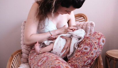 Portfolio building photo of new mother breastfeeding